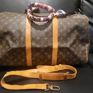 Authentic Louis Vuitton Keepal 50 Badouliere travel duffel luggage bag.